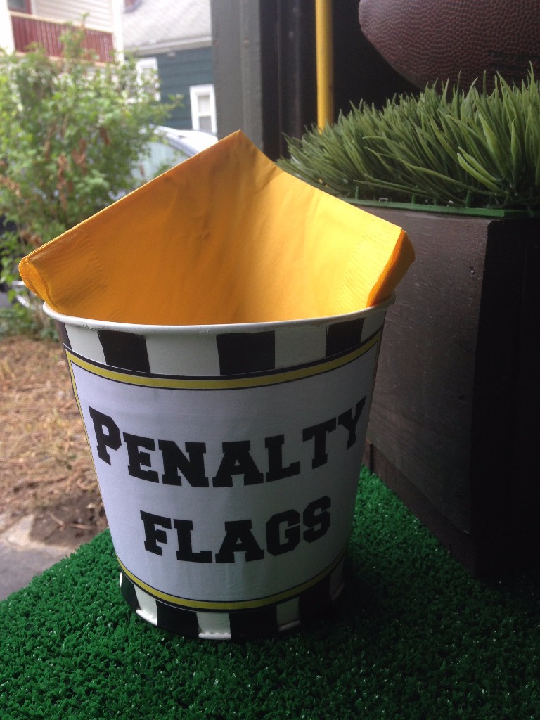 Penalty flag napkin bucket